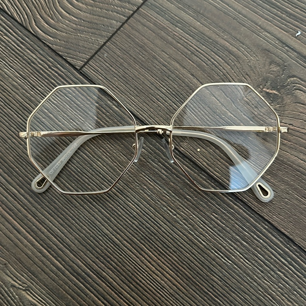 Glasses !! With blank lenses no prescription.